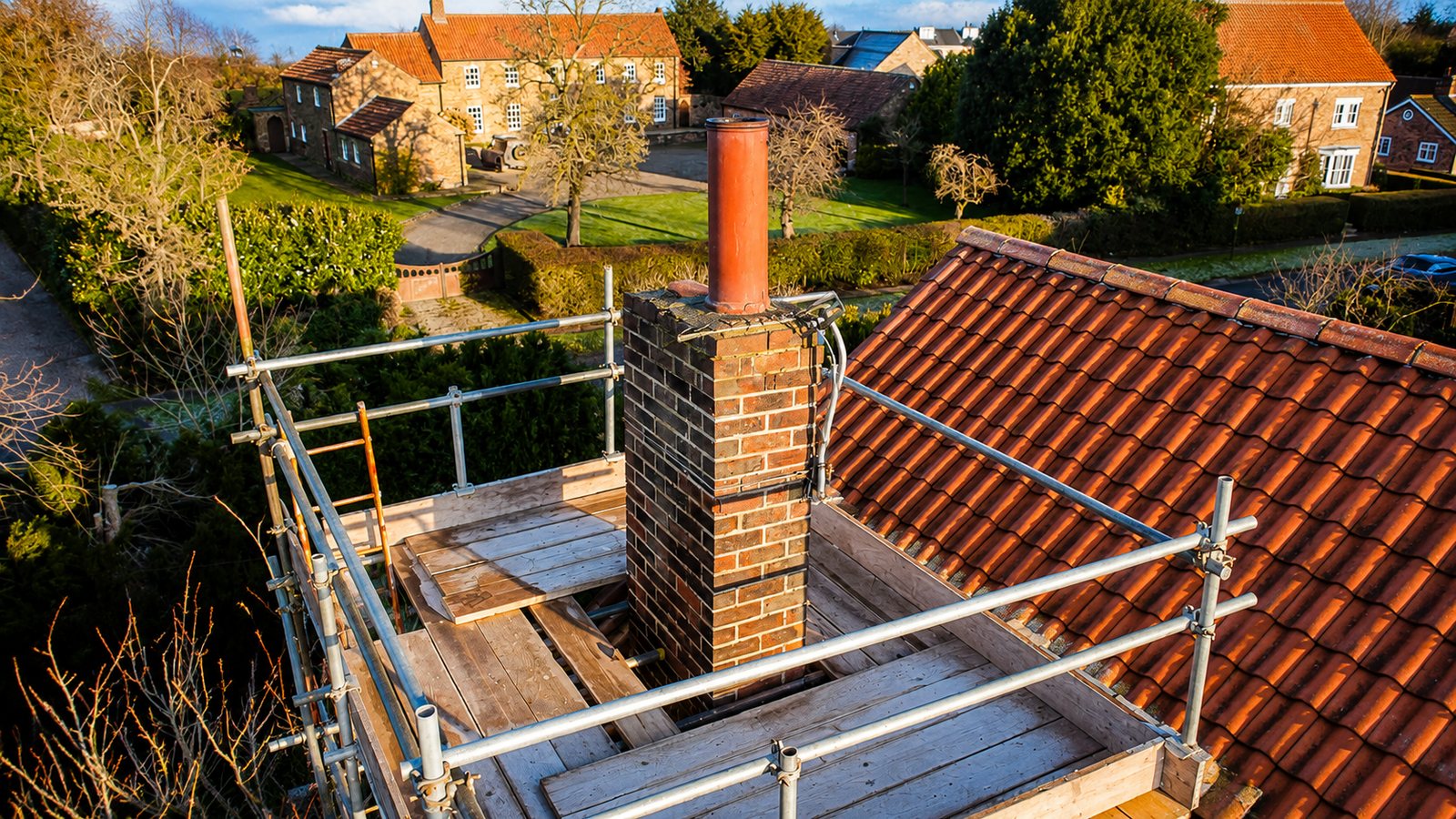 Scaffolding around a chimney for repairs