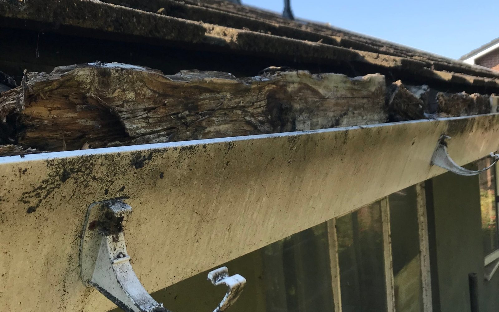 Rotten wooden fascia needing replacement
