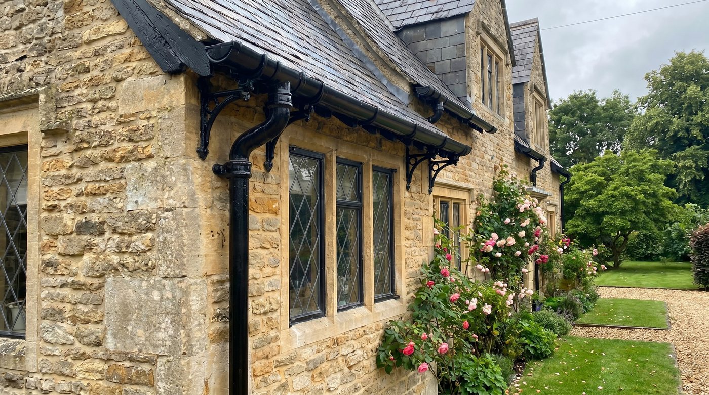 Cast iron guttering on a stone cottage