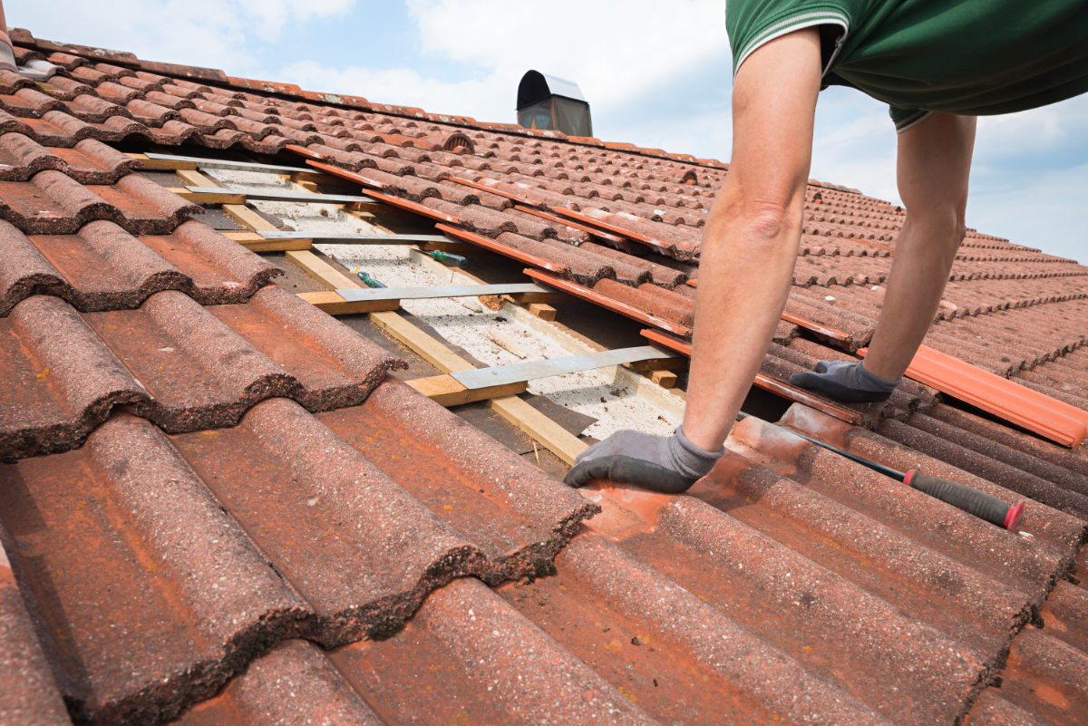 Replacing broken concrete roof tiles